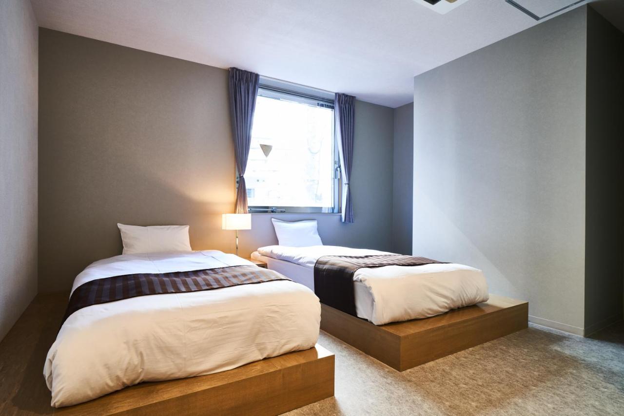 &and Shinsaibashi East Albergue